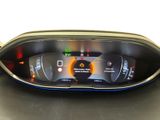 the dashboard of a car with a digital display on it