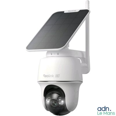 an image of a solar powered security camera mounted on the side of a building