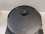 a black stove top with a black burner on it
