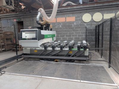 a machine that is working on a machine in a factory
