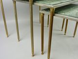 three tables that are sitting on top of each other