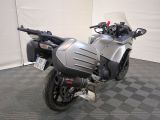 a motorcycle that is parked on the floor in a room