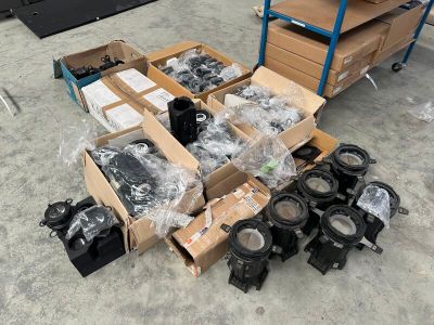 many boxes of assorted items sitting on the floor
