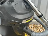 a vacuum that is sitting on top of a pile of rocks