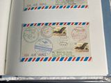 an open book with stamps on it sitting on a table