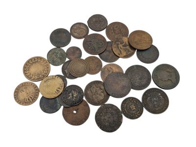 an image of a pile of old coins on a white surface