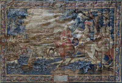 une image représentant une tapisserie sur laquelle figurent deux hommes à cheval