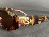 a close up of a pair of sunglasses on a table
