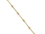 a yellow gold bracelet with a diamond cut design