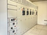 a room that has a bunch of electrical equipment in it