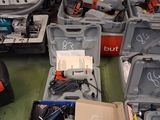 a lot of tools that are sitting on the floor