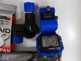 two watches and a box of pills on the table