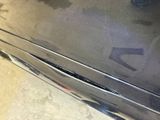 a close up of a car ' s front bumper