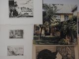 a bunch of pictures hanging on the wall of a house