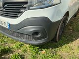 a white van that is parked in the grass