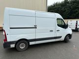 a white van that is parked in a parking lot