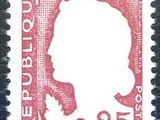 the stamp is red and white with a silhouette of a man
