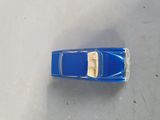 a toy car that is sitting on the floor