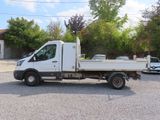 a white truck that is parked in the parking lot