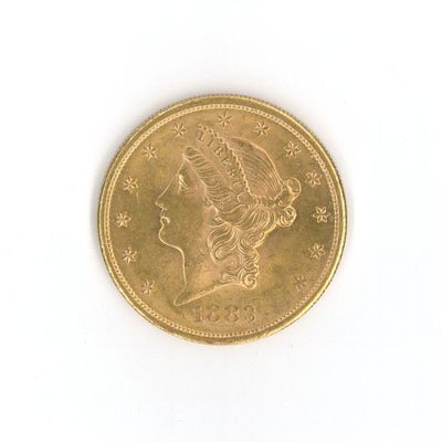 une image d'une pièce d'or sur une surface blanche