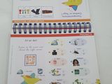 a notebook with a picture of a bird on it