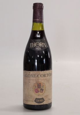 a bottle of wine that is sitting on a table