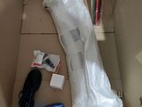 a box with a pair of shoes and a plastic bag on it