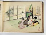 two women sitting on the floor in front of a window