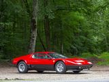 a red sports car parked on the side of the road
