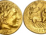 a gold coin with an image of a man on a horse