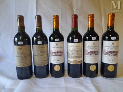 six bottles of wine are lined up in a row on a table