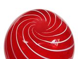 a red ball with white stripes on it on a white surface