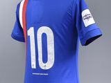 a close up of a blue soccer jersey with the number 10 on it