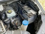 a car engine with the hood open and the hood down