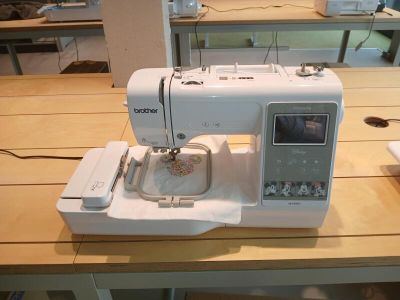 a sewing machine sitting on a table in a room
