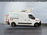 a white van with a ladder on the back of it