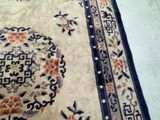 a large oriental rug on the floor in a room