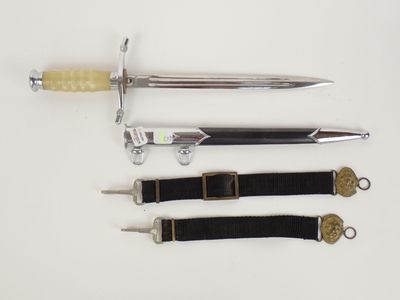 three different types of knives on a white surface