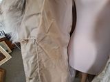 two mannequins that are standing next to each other