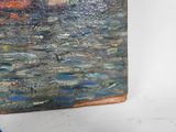 a painting that is on the wall next to a blue chair