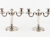 pair of silver plated candelabs with candlesticks on stands