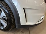 a close up view of a car ' s front bumper