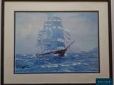 tableau représentant un voilier en pleine mer, dans un cadre