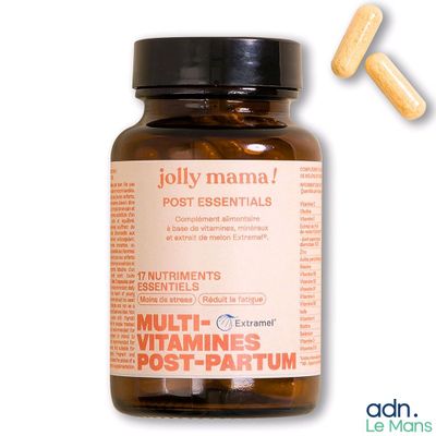 un flacon de multivitamines à côté d'un flacon de comprimés