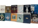 a lot of books that are sitting on a table