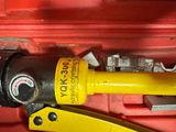 a close up of a pair of scissors in a tool box