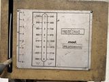 a picture of a machine that is sitting in a warehouse