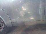 an image of a car that is parked on the side of the road