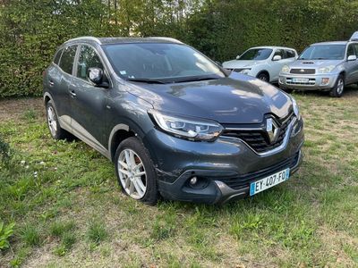 renault c - hrc suv in the grass with other cars in the background