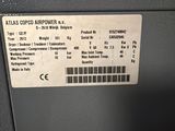 the label on the back of an atlas copp power machine